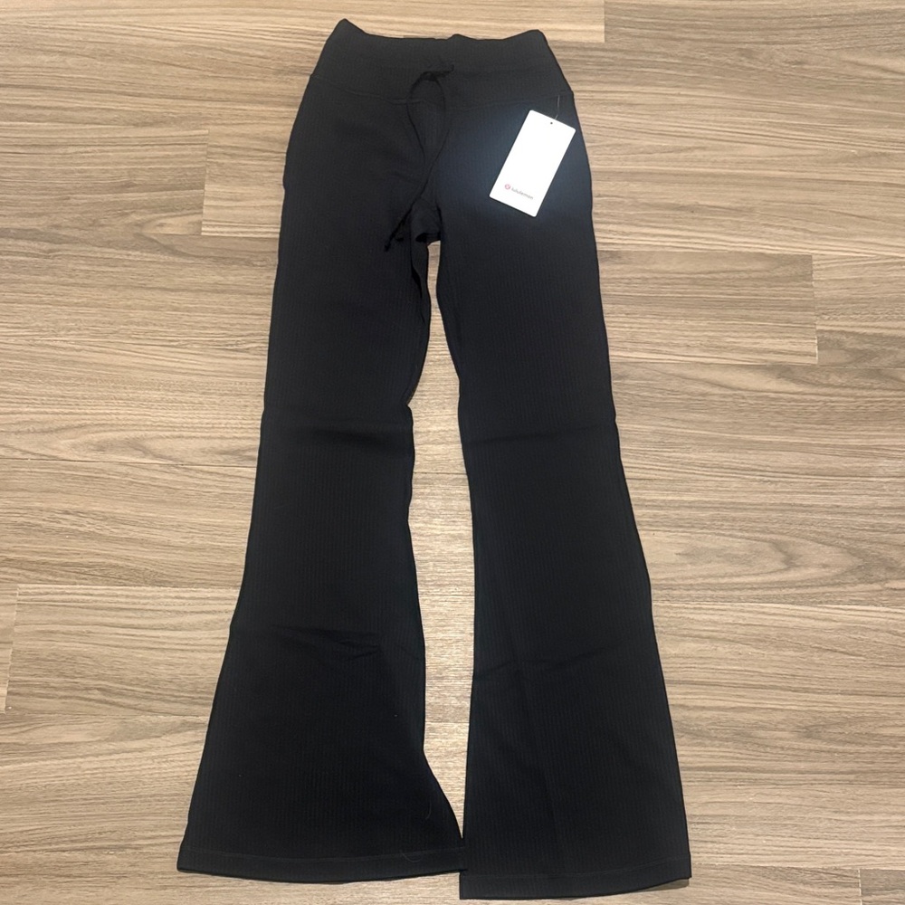Black woman’s lululemon Flared Bottoms Size 6